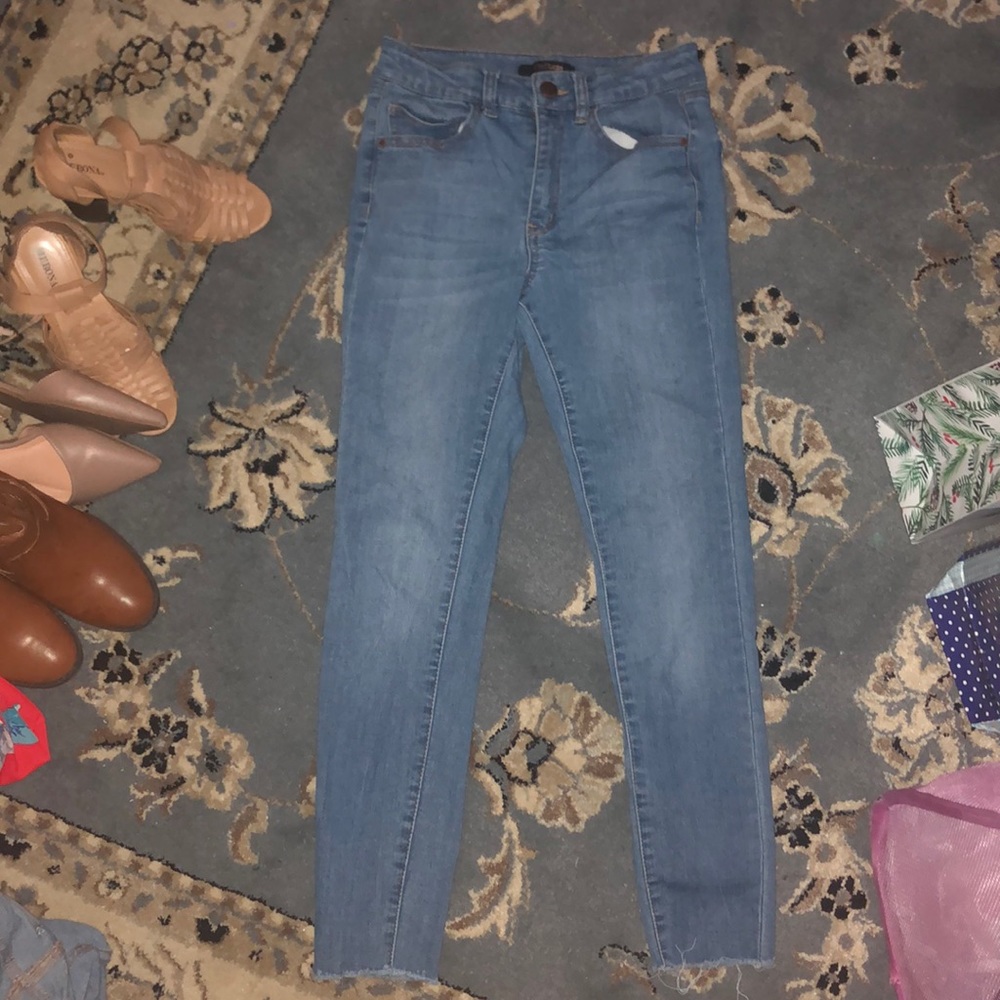 Mid rise light wash denim jeans